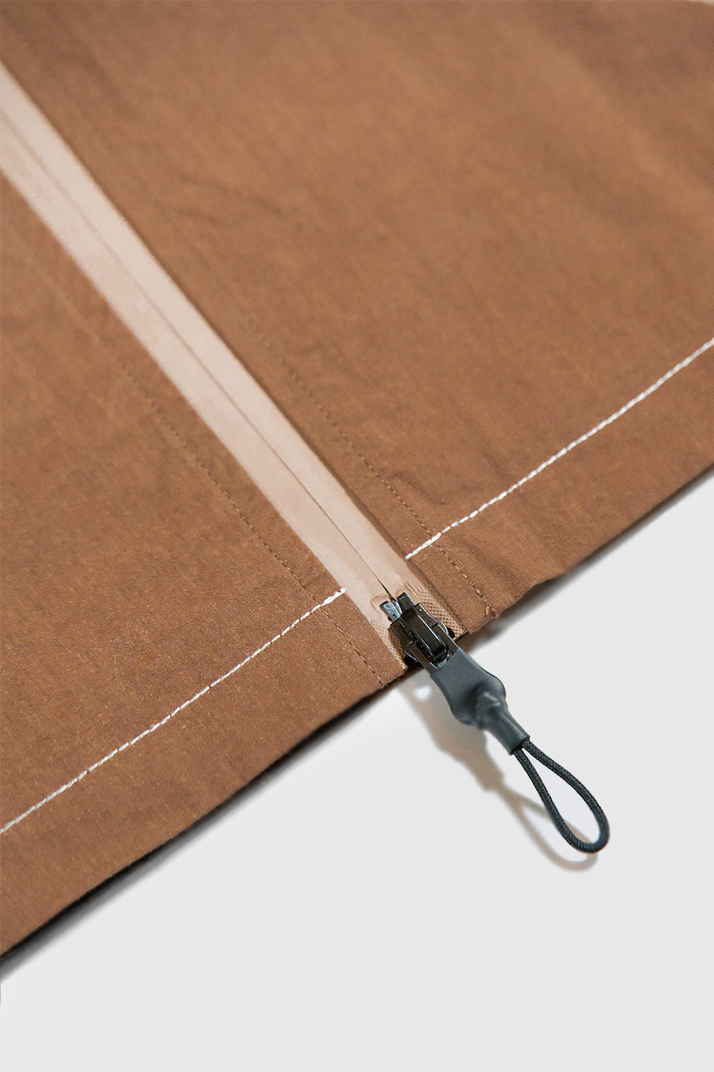 Orbit Stitch Waterproof Track Jacket Brown